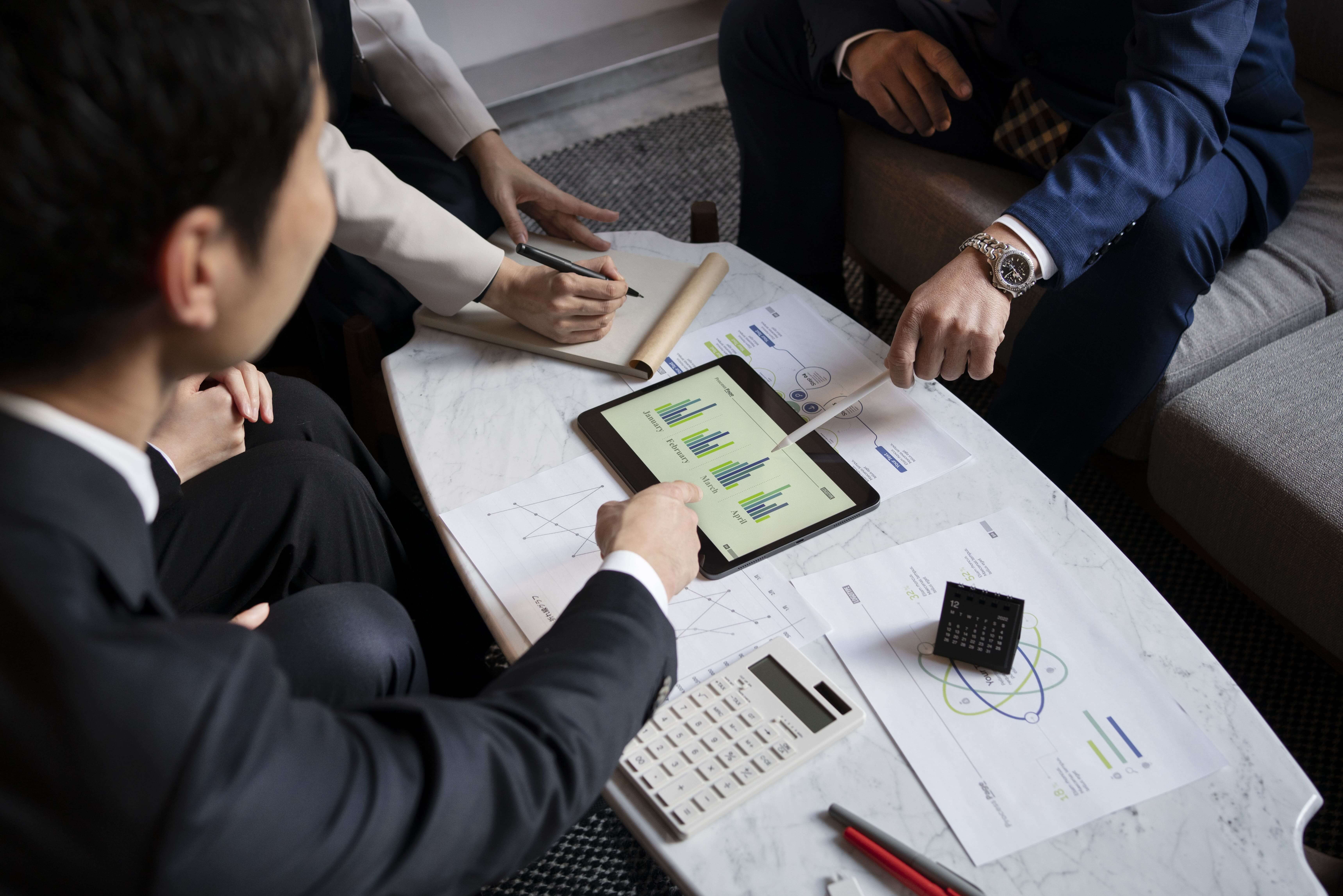 men discussing about business strategy